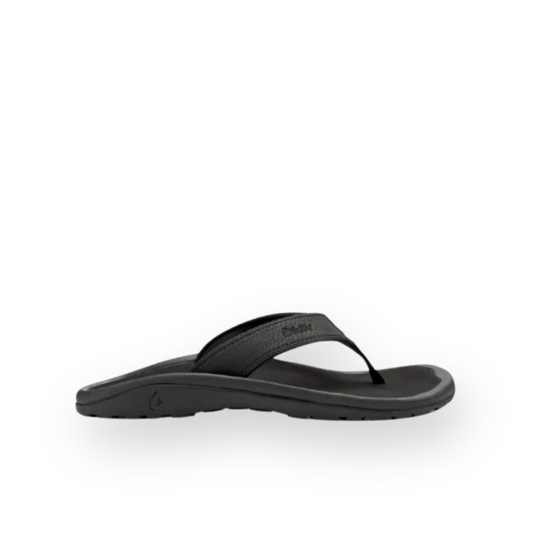 OLUKAI - 'OHANA THONG SANDAL IN BLACK TEXTILE